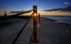 32663-sunset-through-metallic-pillar-hole-1280x800.jpg