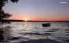 boat-on-a-lake-at-sunset-6710-1280x800.jpg