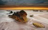 mossy-rocks-in-the-ocean-water-33961-1280x800.jpg