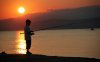 boy_river_lake_fishing_fishing_rod_sunset.jpg