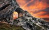 49748-amazing-sunset-view-through-the-stone-arch.jpg