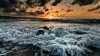 waves-reaching-the-rocky-beach-at-sunset-48984-(1).jpg