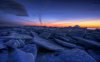 33058-susnet-over-the-ice-1280x800-nature-wallpape.jpg