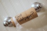 144839075-toilet-paper-empty-cardboard-toilet-paper-roll-on-spool-reading.jpg