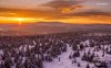 sunset-over-a-vast-snowy-forest-7068-1280x800.jpeg