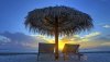thatched-umbrella-on-sandy-beach-34056-1280x800-1.jpg