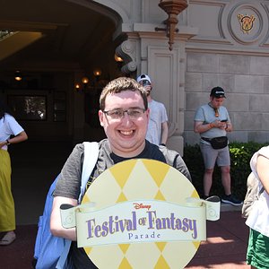 Posing with the Festival of Fantasy sign