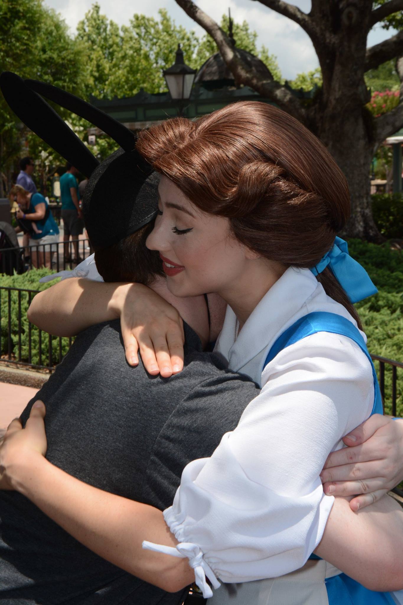 Hugging Villager Belle Bye