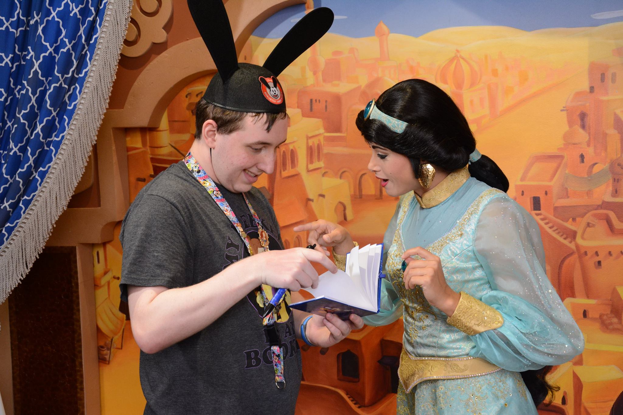 Jasmine notices my Disney pins