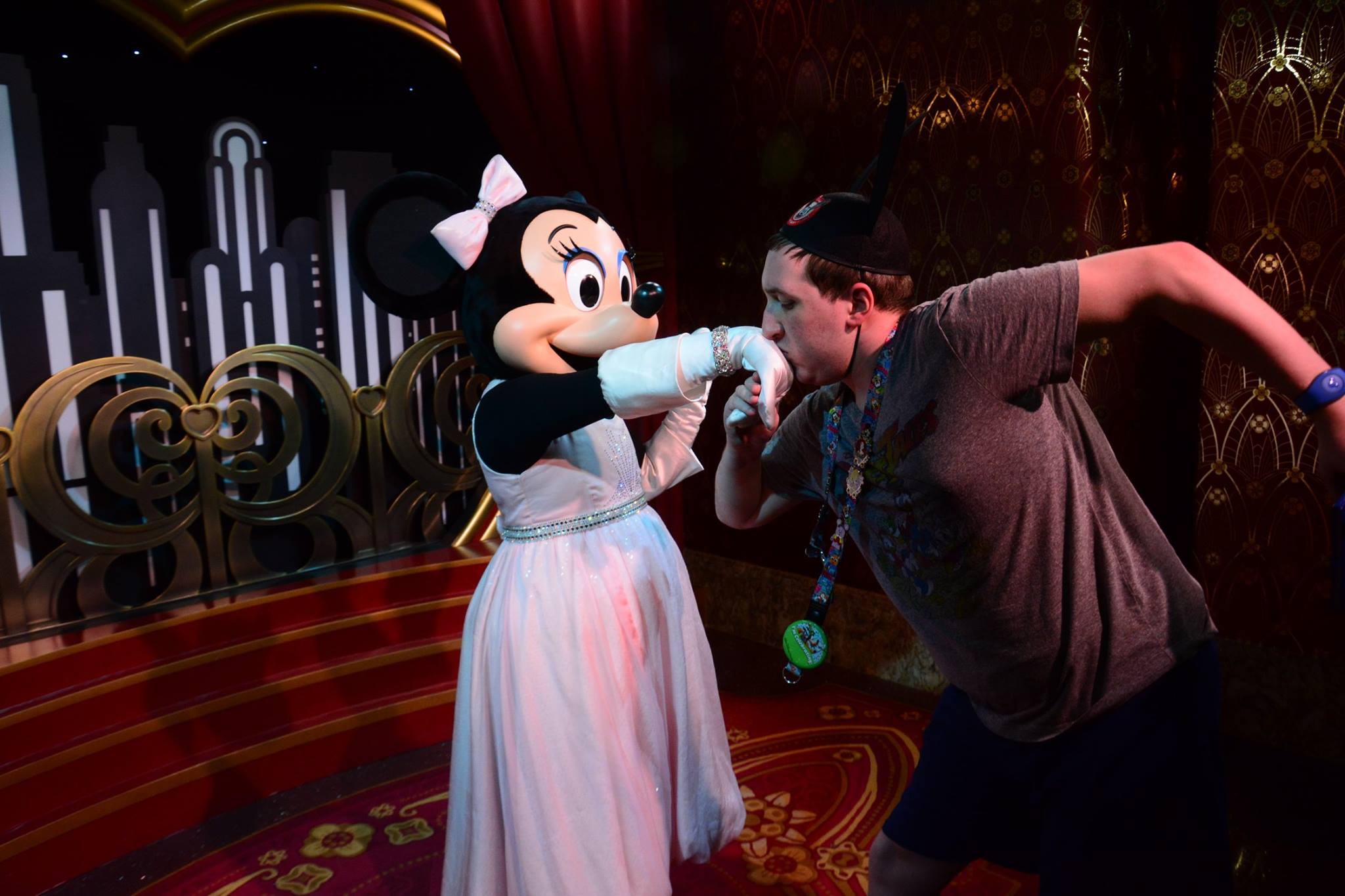 Kissing Minnie's hand