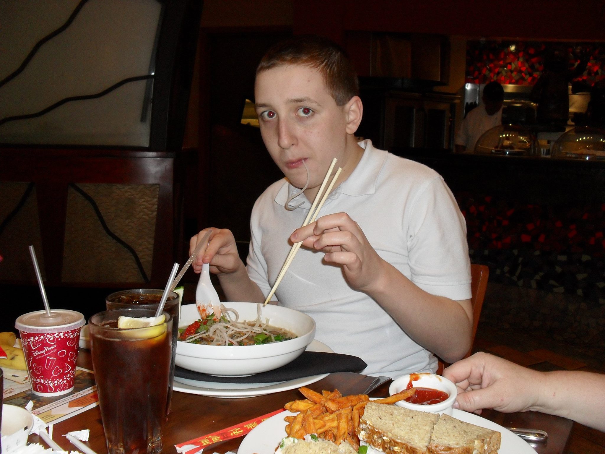 Me trying Chicken Noodle at Kona Cafe